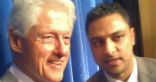Image of Awan with Bill Clinton. Awan is accused of breaking a number of crimes including transferring sensitive data offsite and fraud. 
