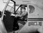Image of A new photograph appears to show Earhart and Noonan awaiting transport on a ship towing their wrecked plane. 