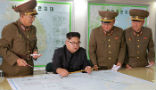 Image of Kim Jong Un has cancelled a planned test to fire four ballistic missiles at Guam. It is apparent the risk of the test is too great for the country to take. 
