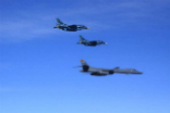 Image of The USA, South Korea, and Japan have performed a joint exercise which included flying a bomber off the east coast of North Korea. 