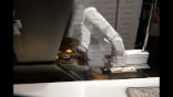 Image of Flippy is the first of hundreds of burger flipping robots, set to be rolled out over the next couple years. 