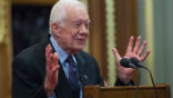 Image of President Carter says he prays for President Trump.