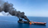 Image of A tanker blazes after an alleged attack by Iranian or Iranian-backed forces. 
